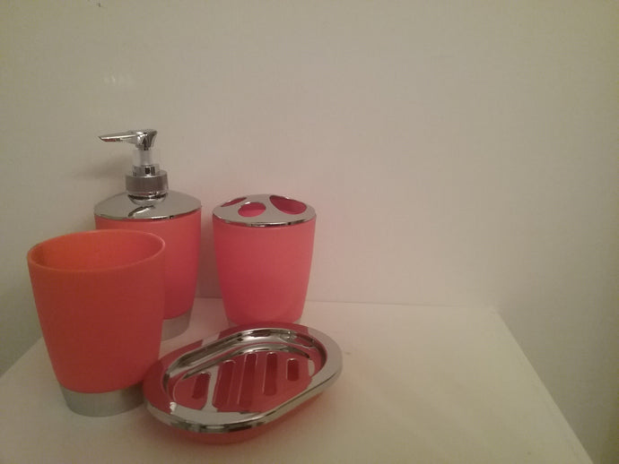 Red Orange and Silver Bathroom Accessory Set - 4 Piece Red Orange and Silver Bathroom Accessory Set, which includes:  Soap Dish, Lotion Dispenser, Rinse Cup and Toothbrush Holder