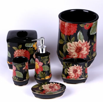 Black Bathroom Accessory Set This set has pink and red with green leaves peony flowers against a black background.  The set includes:  waste basket, soap dish, toothbrush/toothpaste holder, rinse cup, tissue box and lotion dispense The material is resin.
