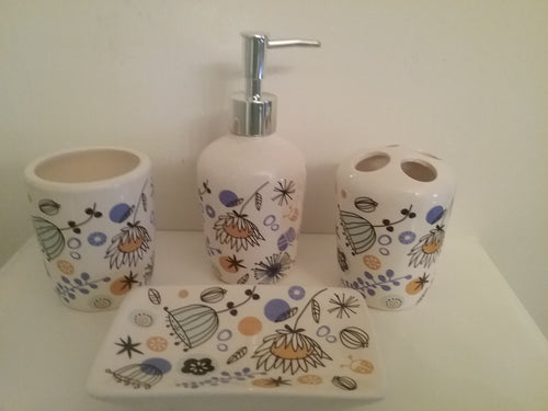 Orange, Black and Blue Bathroom Accessory Set.  The set includes:  lotion dispenser, soap dish, toothbrush holder and tumbler.