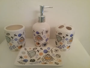 Orange, Black and Blue Bathroom Accessory Set.  The set includes:  lotion dispenser, soap dish, toothbrush holder and tumbler.