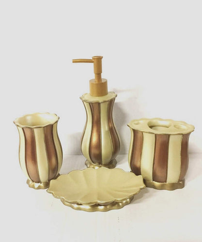 4 piece ceramic beige and gold bathroom accessory set, which includes:  Lotion Dispenser, Toothbrush/Tooth paste Holder, Tumbler and Soap Dish.